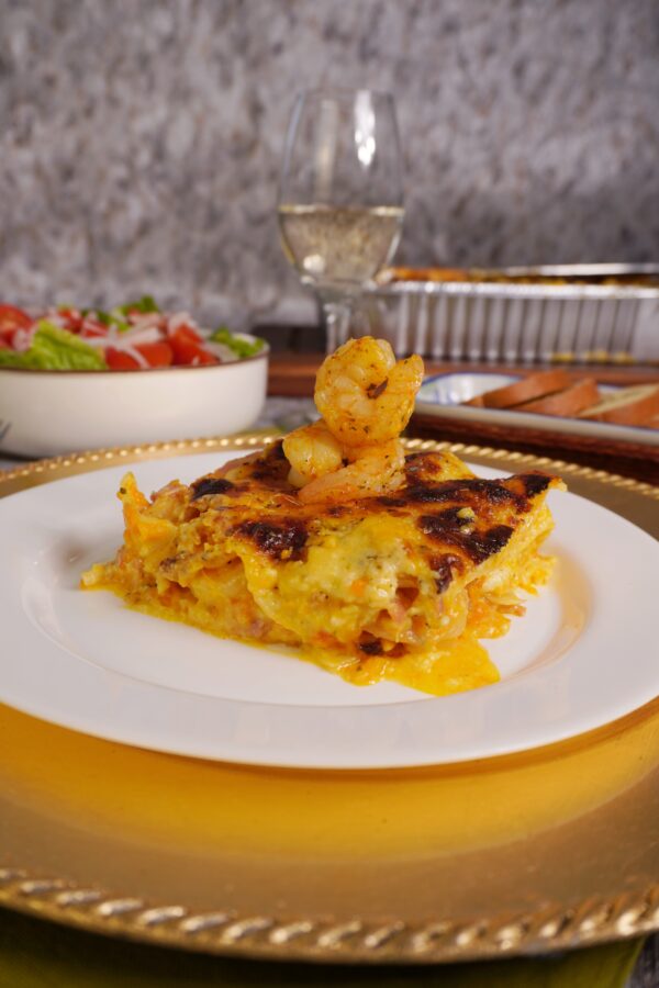Lasagna de camarón y tocino